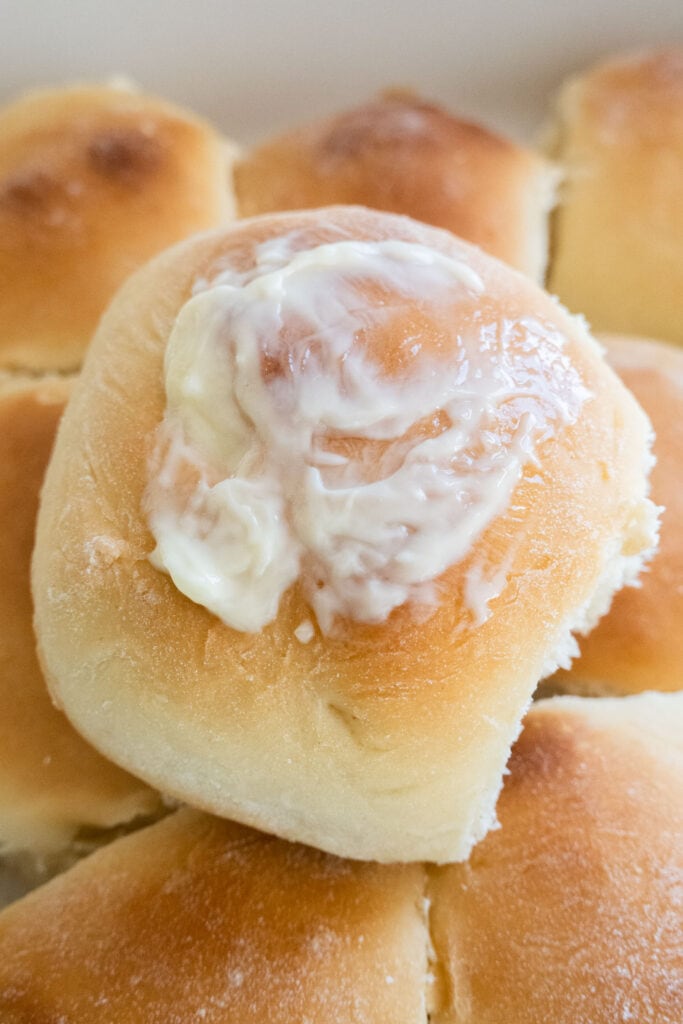 sweet roll with butter on top of it.
