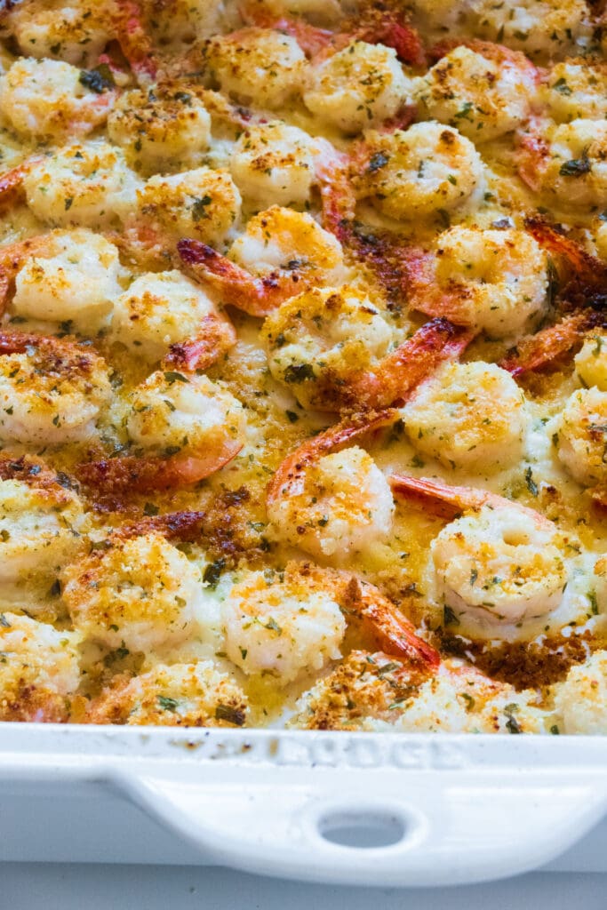 white dish filled with crispy baked shrimp.