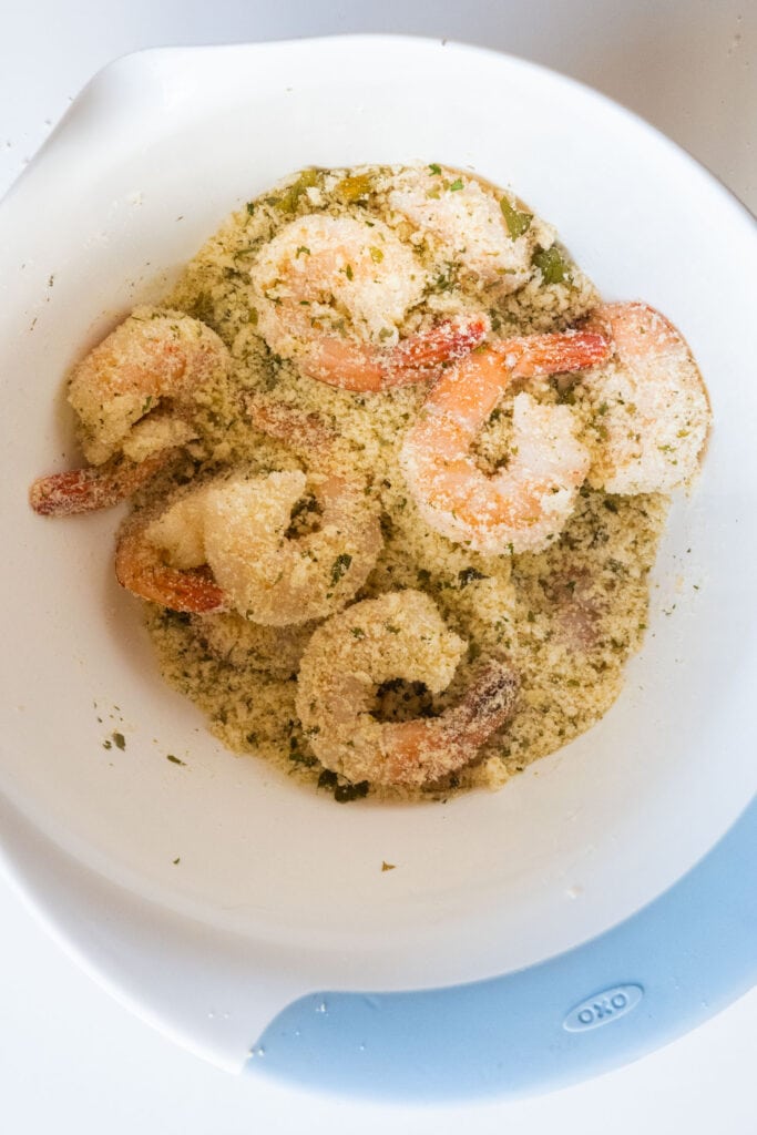 shrimp in dry ingredients in bowl.