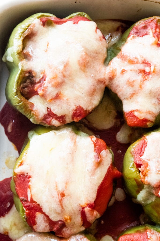 closeup of cooked stuffed pepper with melted mozzarella cheese.