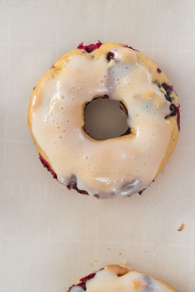blueberry donut on wax paper.