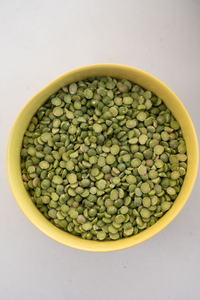 dry split peas in yellow bowl. 
