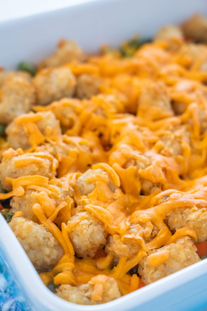 melted cheese on top of tater tot casserole.