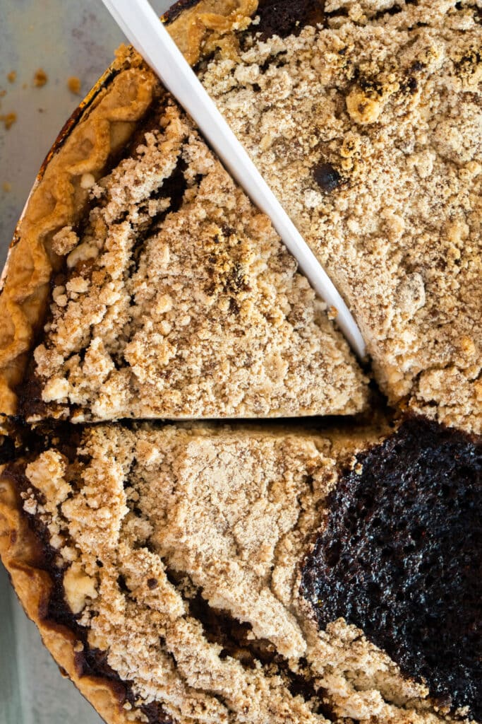 shoofly pie being cut into slices.
