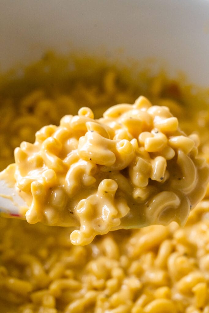 Classic creamy crockpot mac and cheese that uses Velveeta cheese. This homemade slow cooker mac and cheese is ready in 2 hours! Toddler, kid and husband approved!