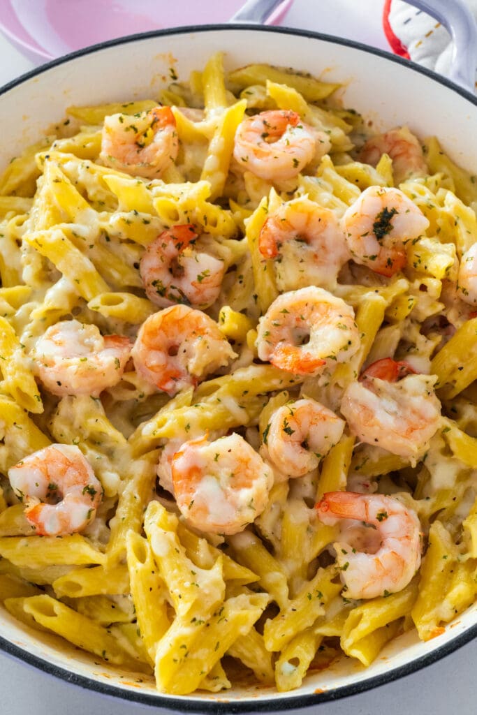 shrimp pasta casserole in skillet on table.