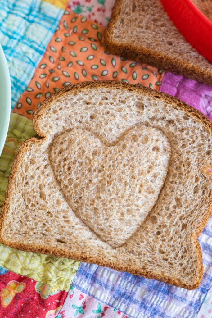 heart indentation on slice of bread.