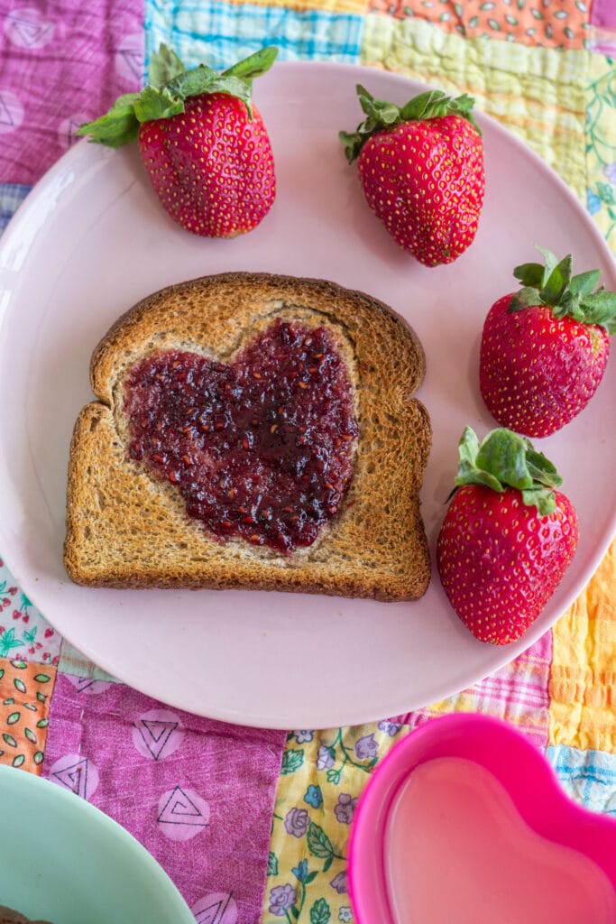 heart toast being served on plate.
