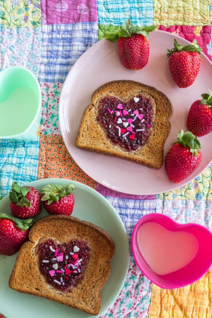 valentine's toast served on plates with heart cups.