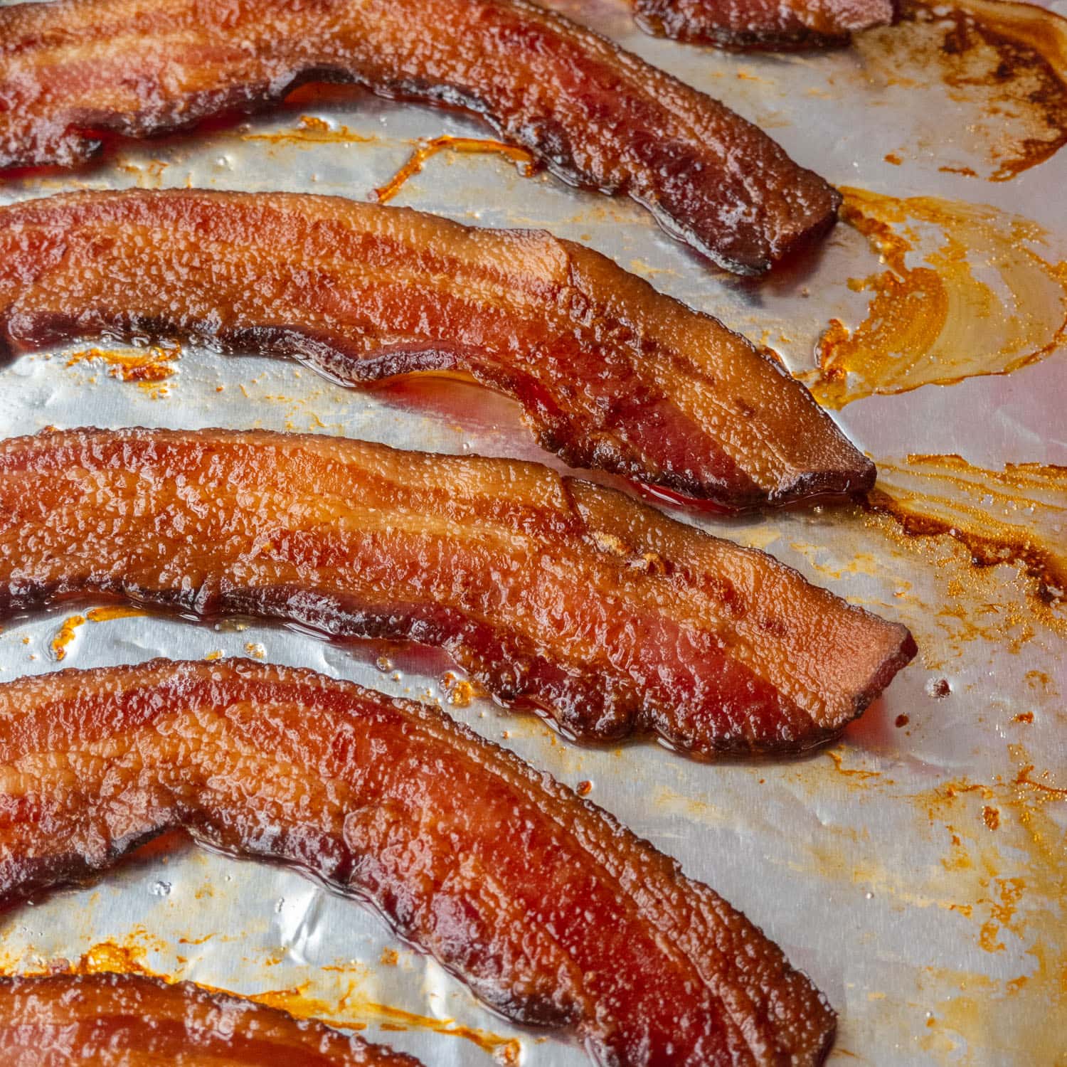 https://brooklynfarmgirl.com/wp-content/uploads/2023/02/How-to-Cook-Bacon-In-The-Oven-Featured-Image.jpg