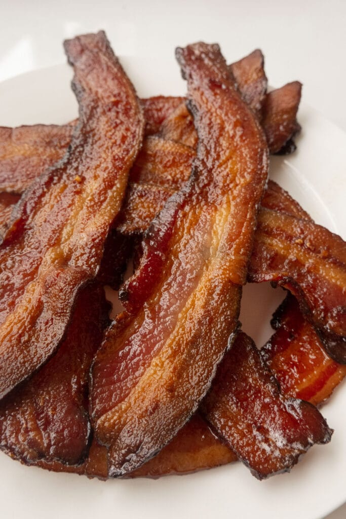 crispy bacon on plate ready to be served.