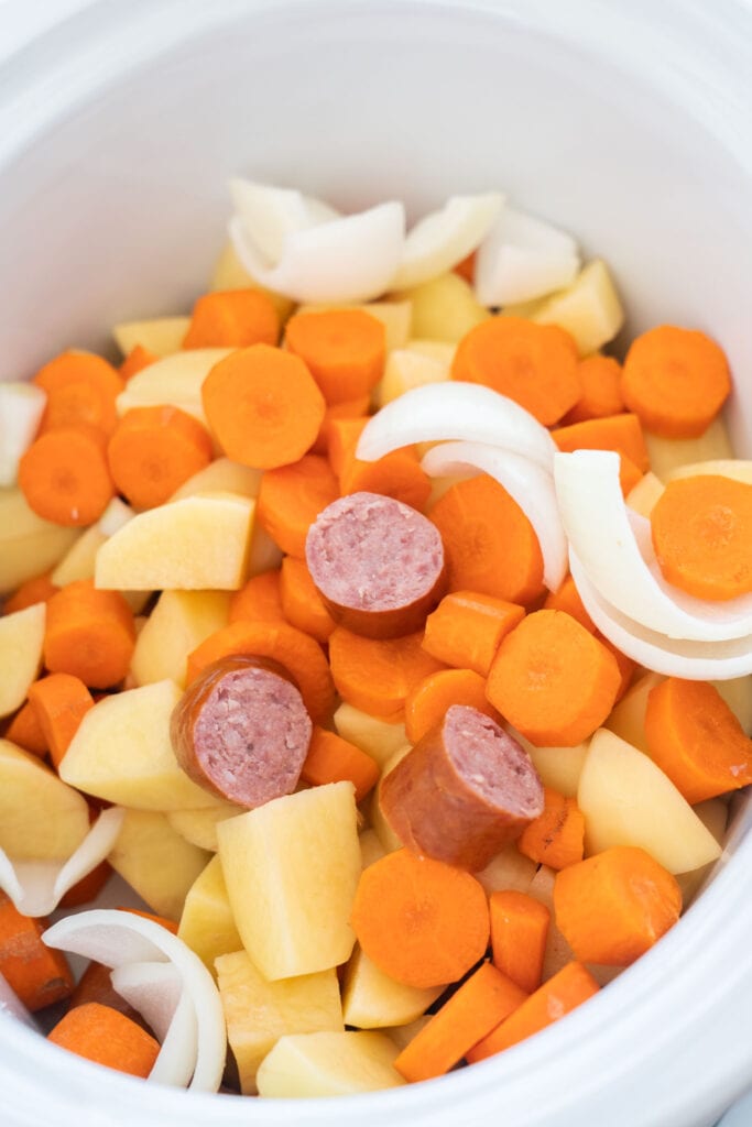 kielbasa and vegetables in slow cooker.