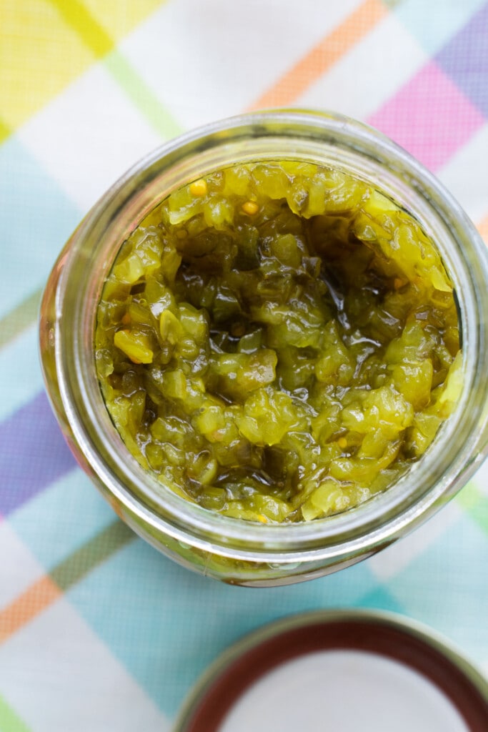 glass jar filled with green relish. 