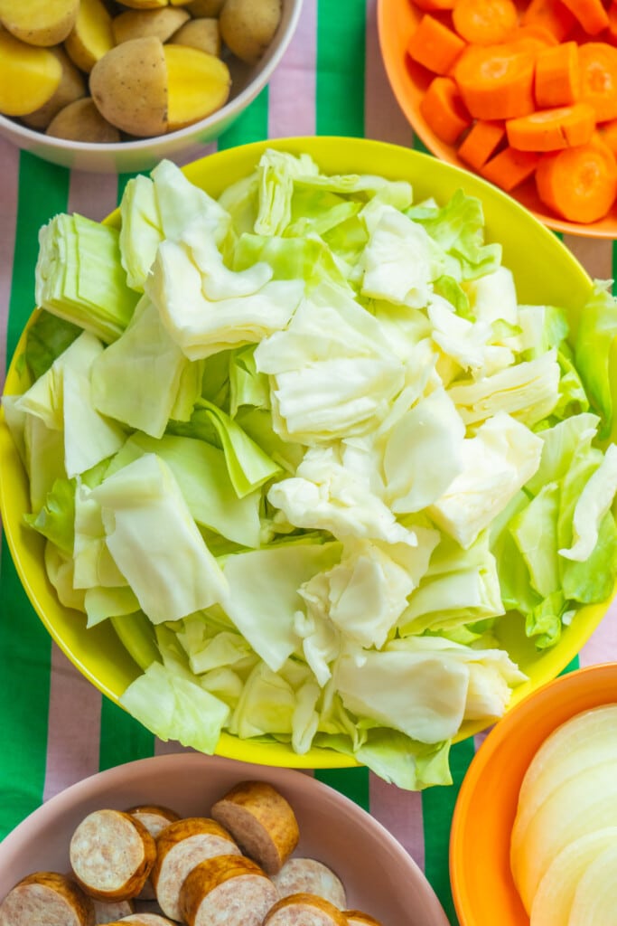 chopped up cabbage in yellow bowl. 