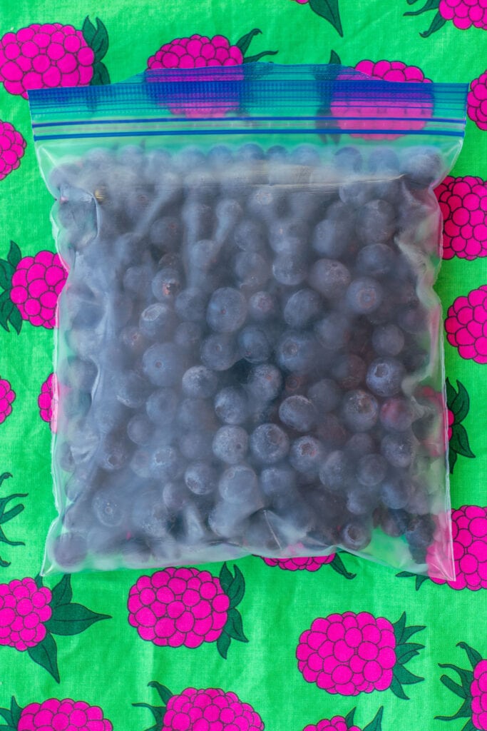 frozen blueberries in plastic bag.
