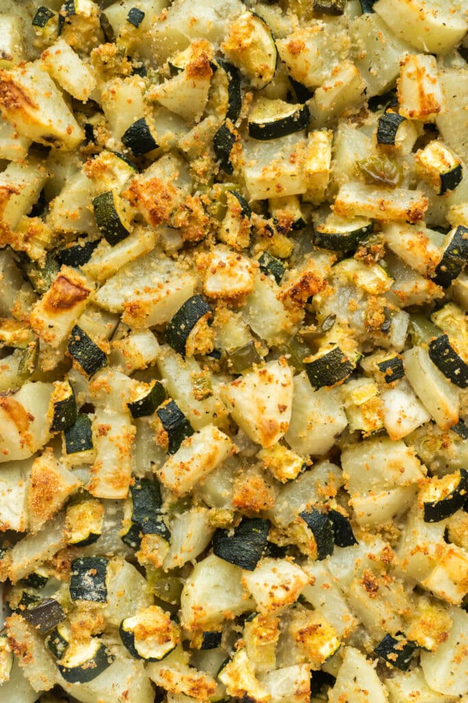 baked zucchini potato casserole straight from the oven, crispy on top.
