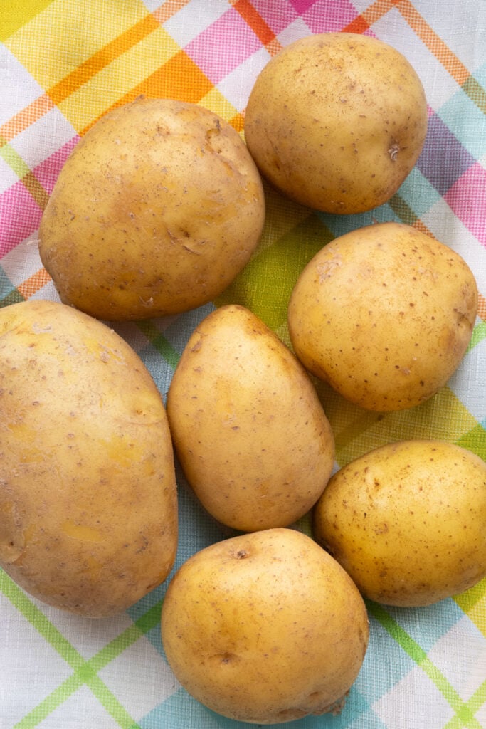 yukon gold potatoes on table.