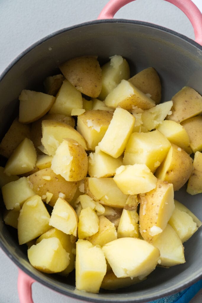 potatoes in pot.