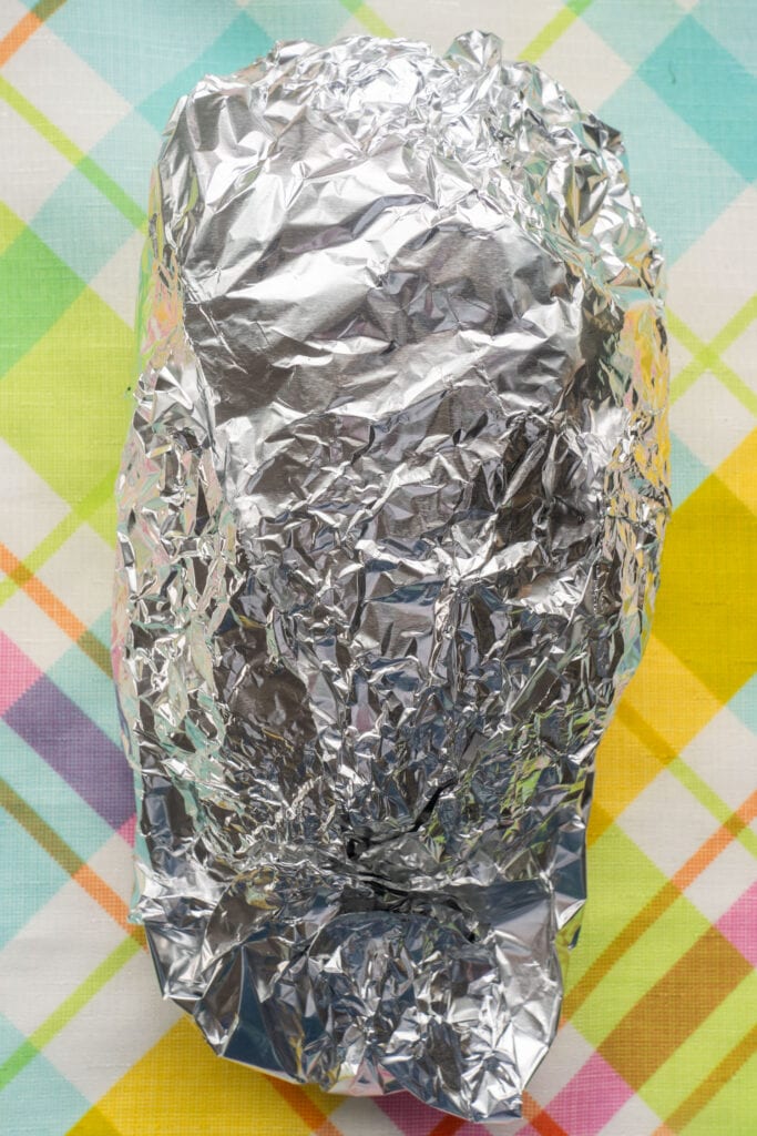 kale bunch wrapped in aluminum foil