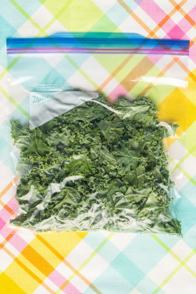 chopped kale in plastic bag.