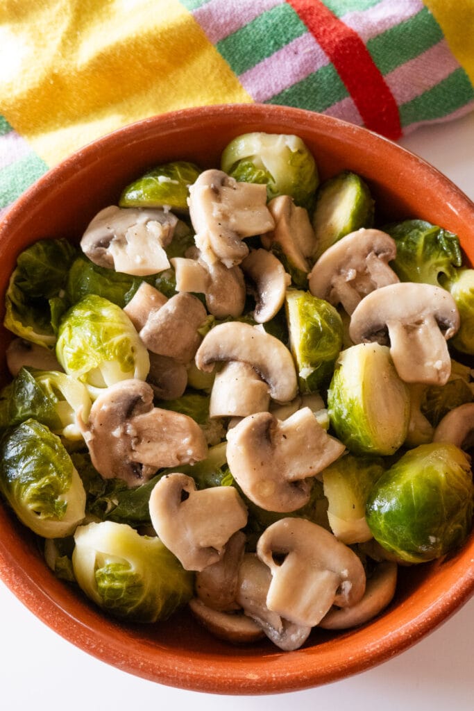 bowl of brussels sprouts and mushrooms in bowl. 