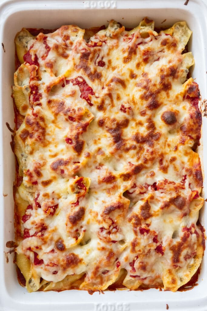 pan filled with baked cheesy stuffed shells. 