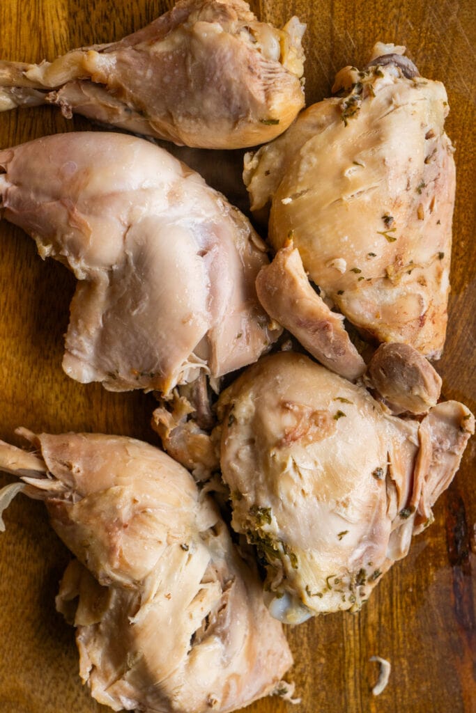 cooked chicken on cutting board.