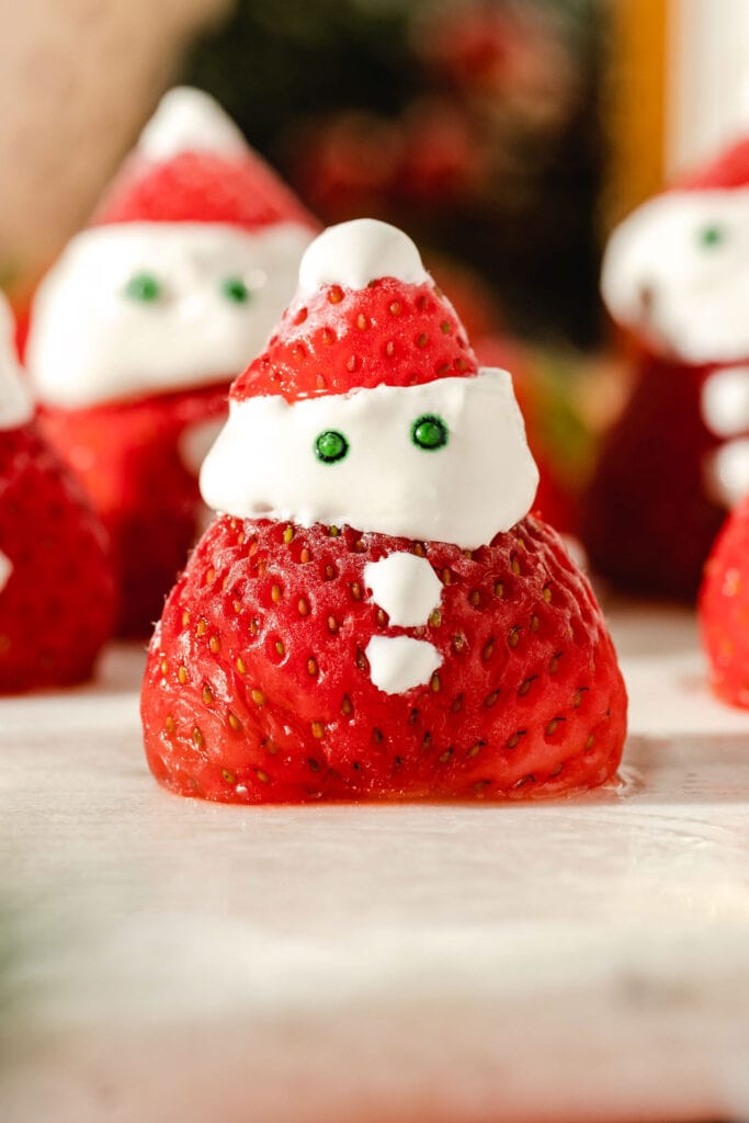 closeup of strawberry santa on table.
