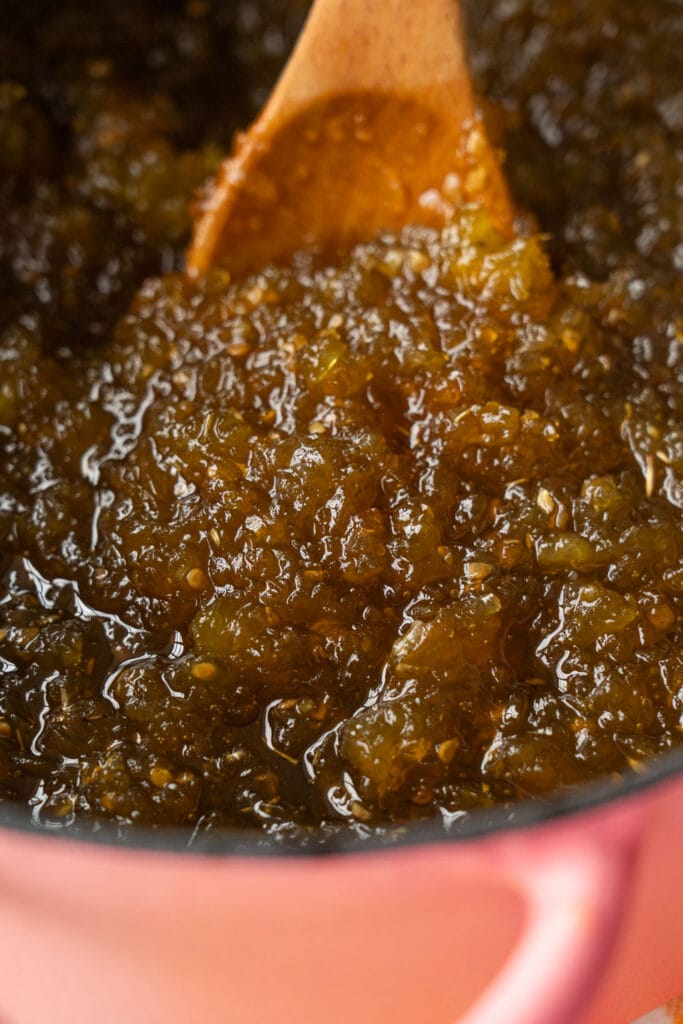 closeup of tomato jam in pot.