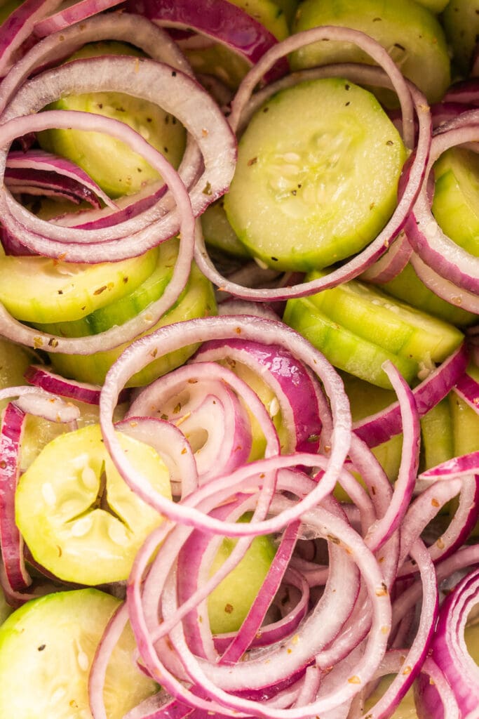 sliced onions and cucumbers.