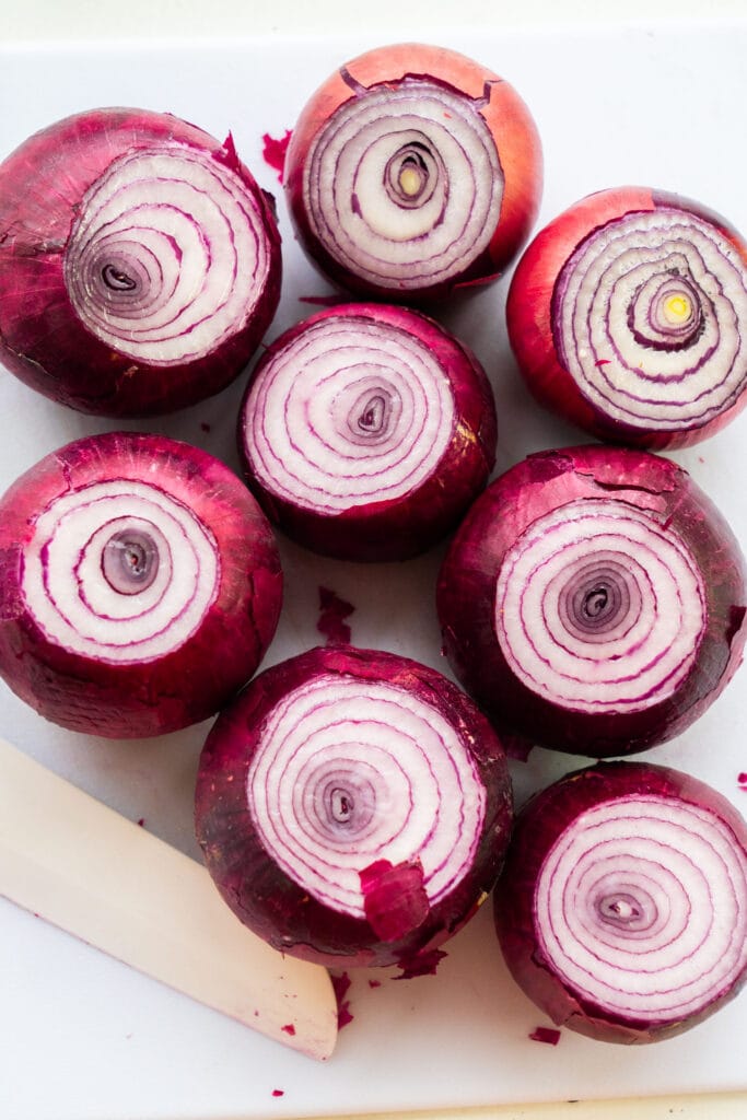 red onions on cutting board chopped.