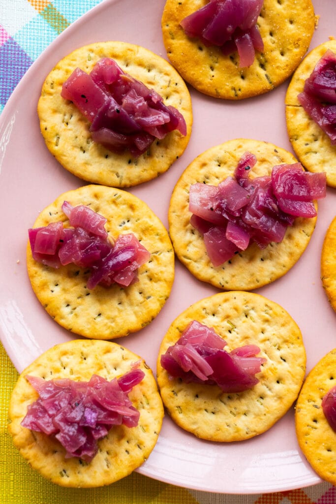 red onion chutney on crackers.