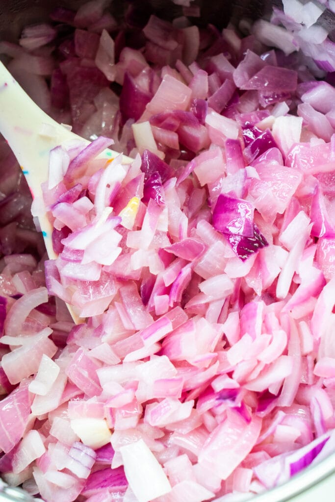 sautéed softened red onions in pot.