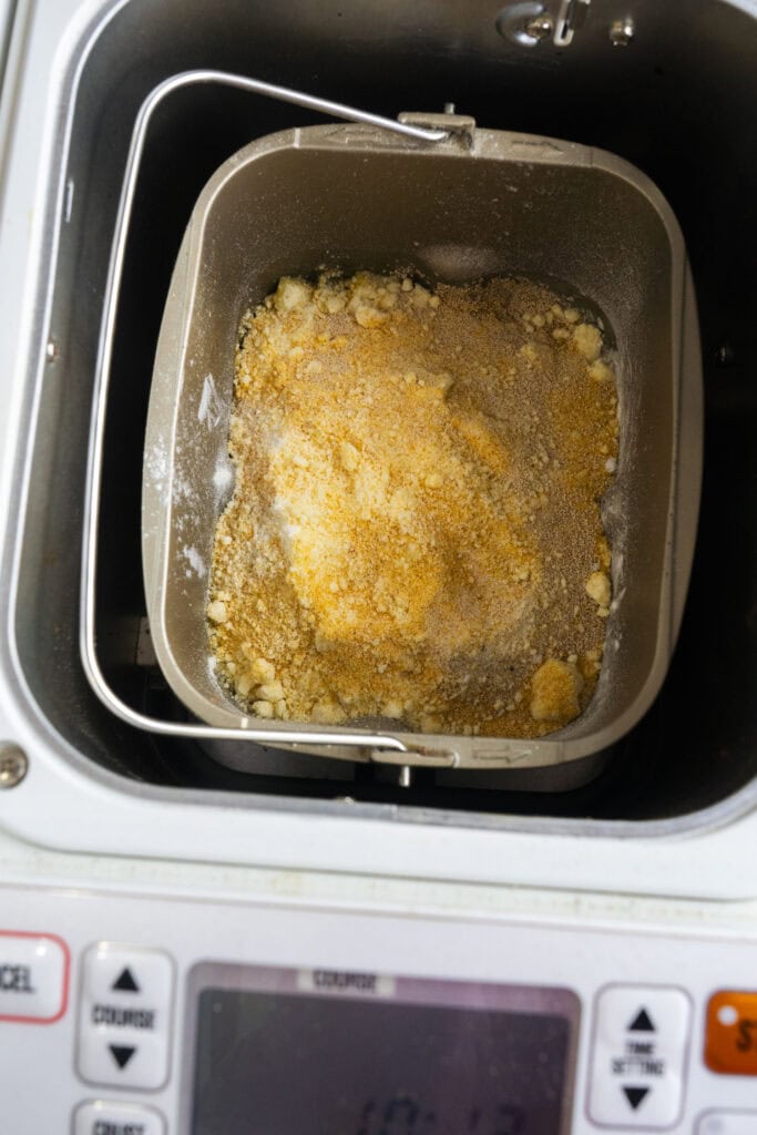 ingredients in baking pan to make garlic bread.