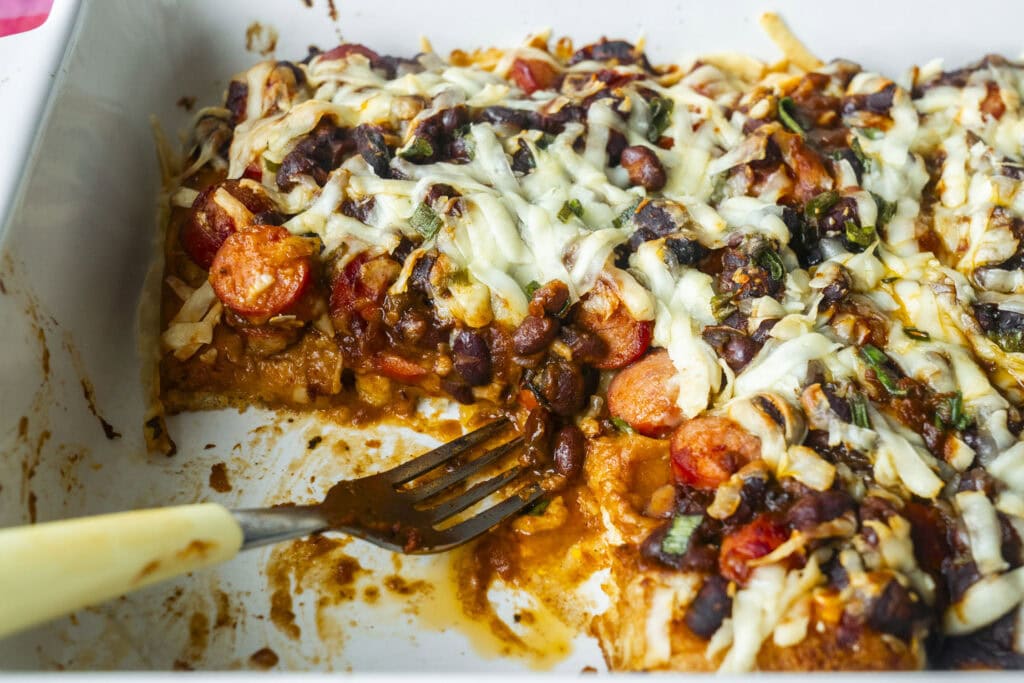 fork inside casserole dish.