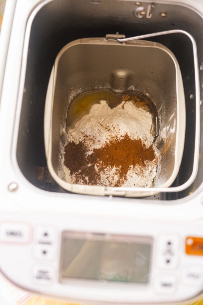 ingredients in bread machine bowl. 