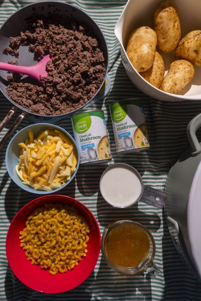 ingredients for hamburger helper on table.