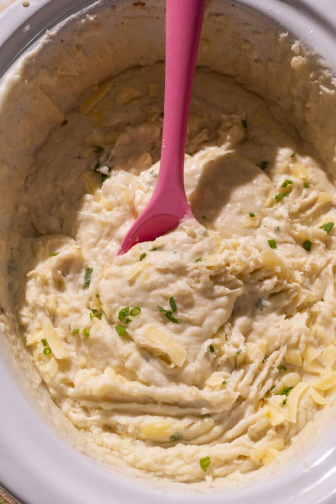spoon serving mashed potatoes straight from crockpot.