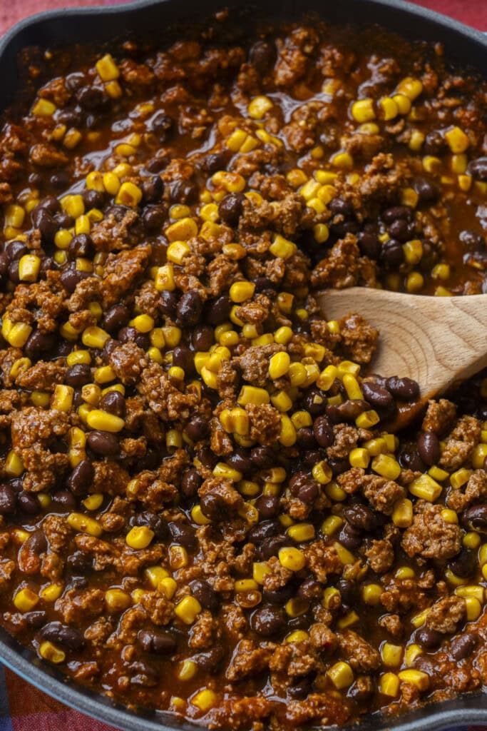 corn and black beans added into pan.