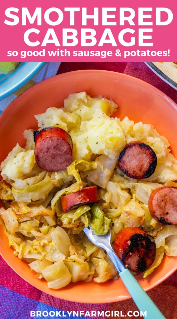 A bowl of smothered cabbage, mashed potatoes, and sliced sausage links with a fork resting in the center.